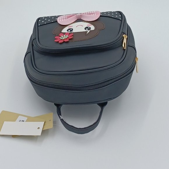 A black back pack mixed with a hint of pink making the perfect blend. - Picture 7 of 8